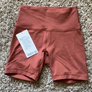 Lululemon Wundertrain 6” short, brick red, size 6